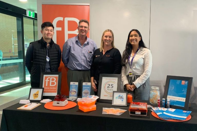 FB Australia team demonstrating biology lab equipment